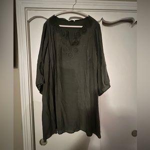 Olive green lined dress, embroidered around v- neck line.